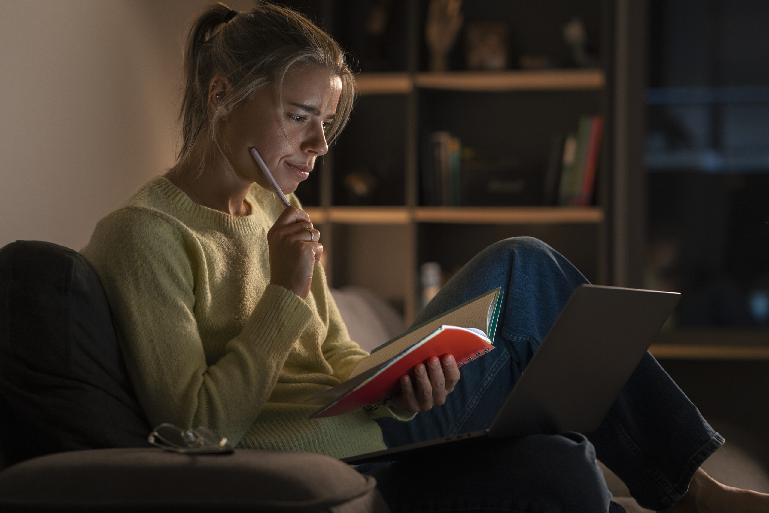 woman-working-late-night-side-view